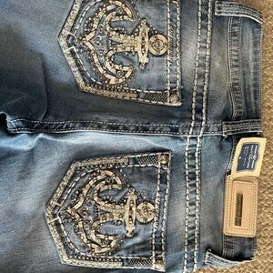 Women size 1 bootcut jean with rhinestones